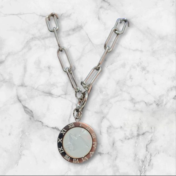 COLLAR GRANDE DE ACERO Y DIJE REVERSIBLE