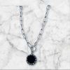 COLLAR GRANDE DE ACERO Y DIJE REVERSIBLE